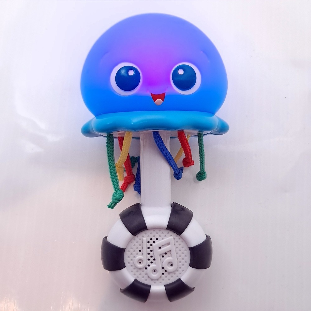 Baby Einstein Octopus rattle toy ocean Glow Infant Sensory Shaker Music lights